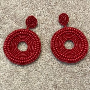 Large red beaded earrings